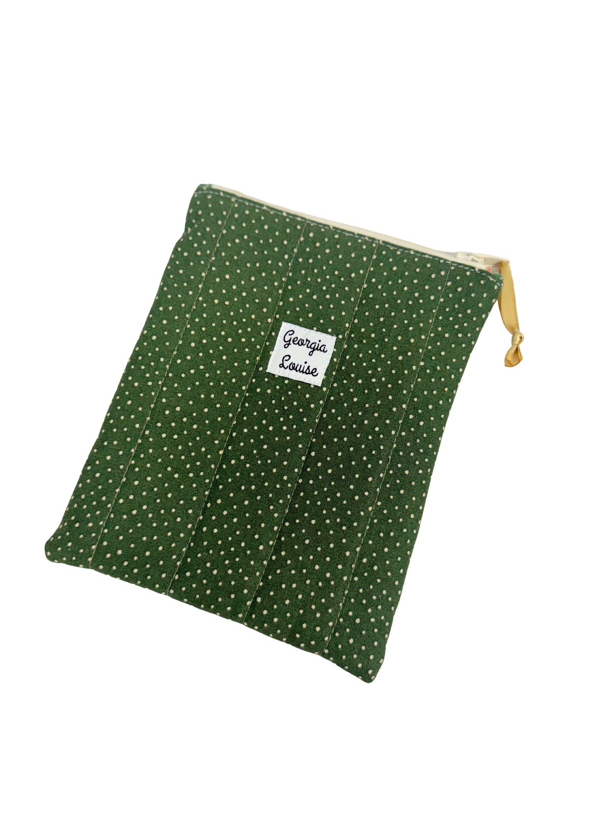 A green fabric kindle pouch with white polka dots and a white zipper, featuring a white label that reads 'Georgia Louise' and a gold zipper pull, shown on a plain white background.