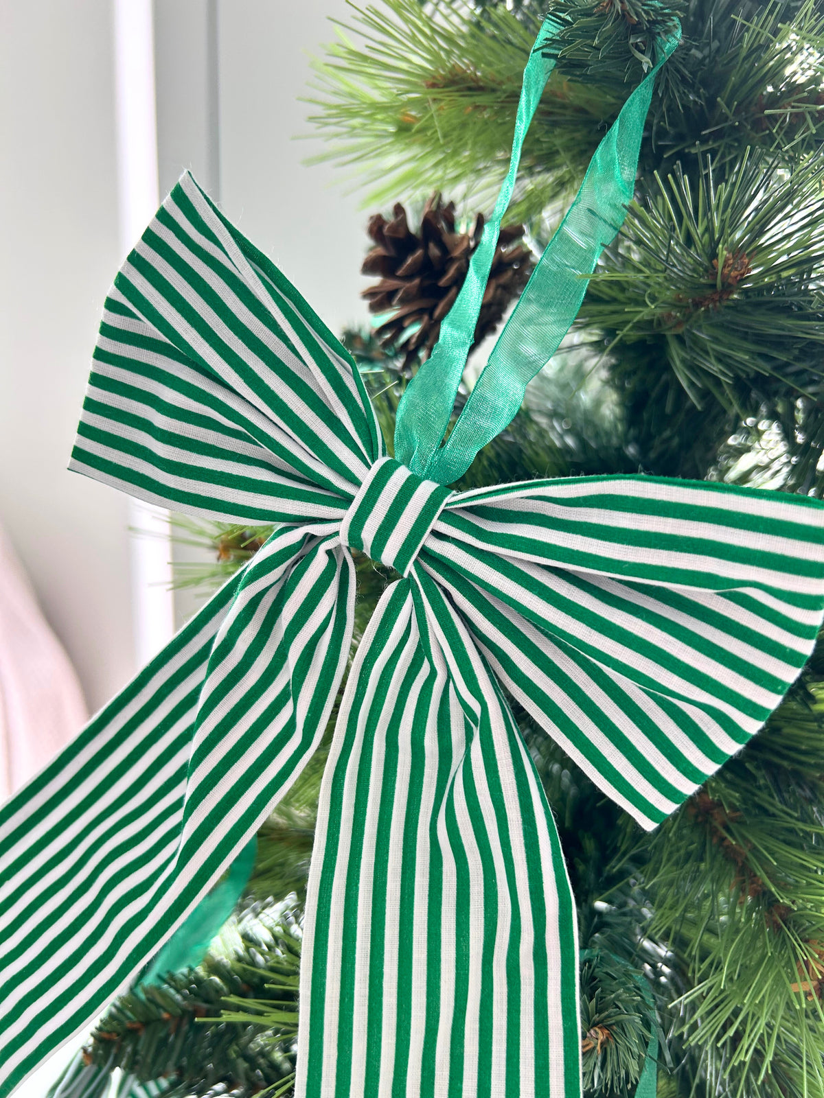 Red Striped Candy Cane Style Christmas Tree Bow