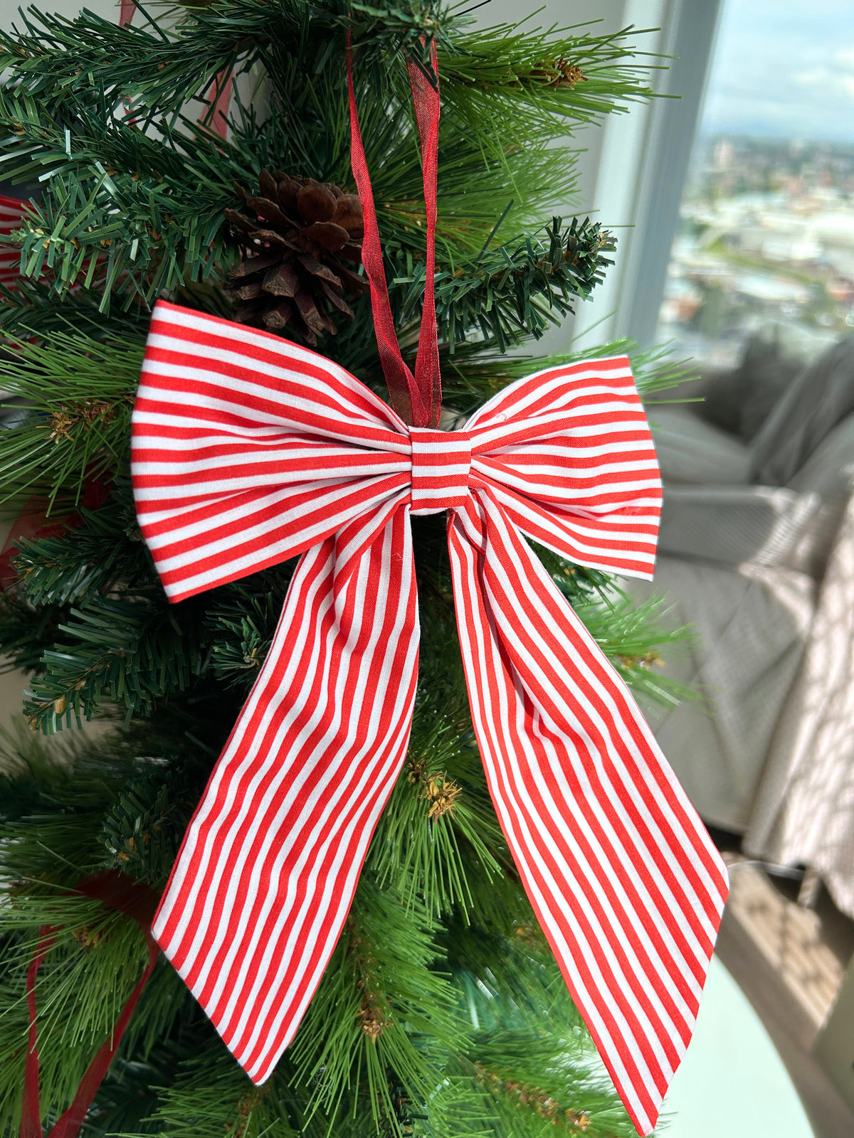 Red Striped Candy Cane Style Christmas Tree Bow